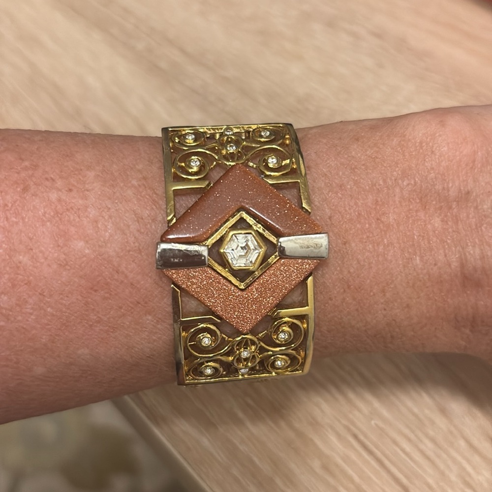 Vintage art deco bracelet with intricate multi strand band and gold stone